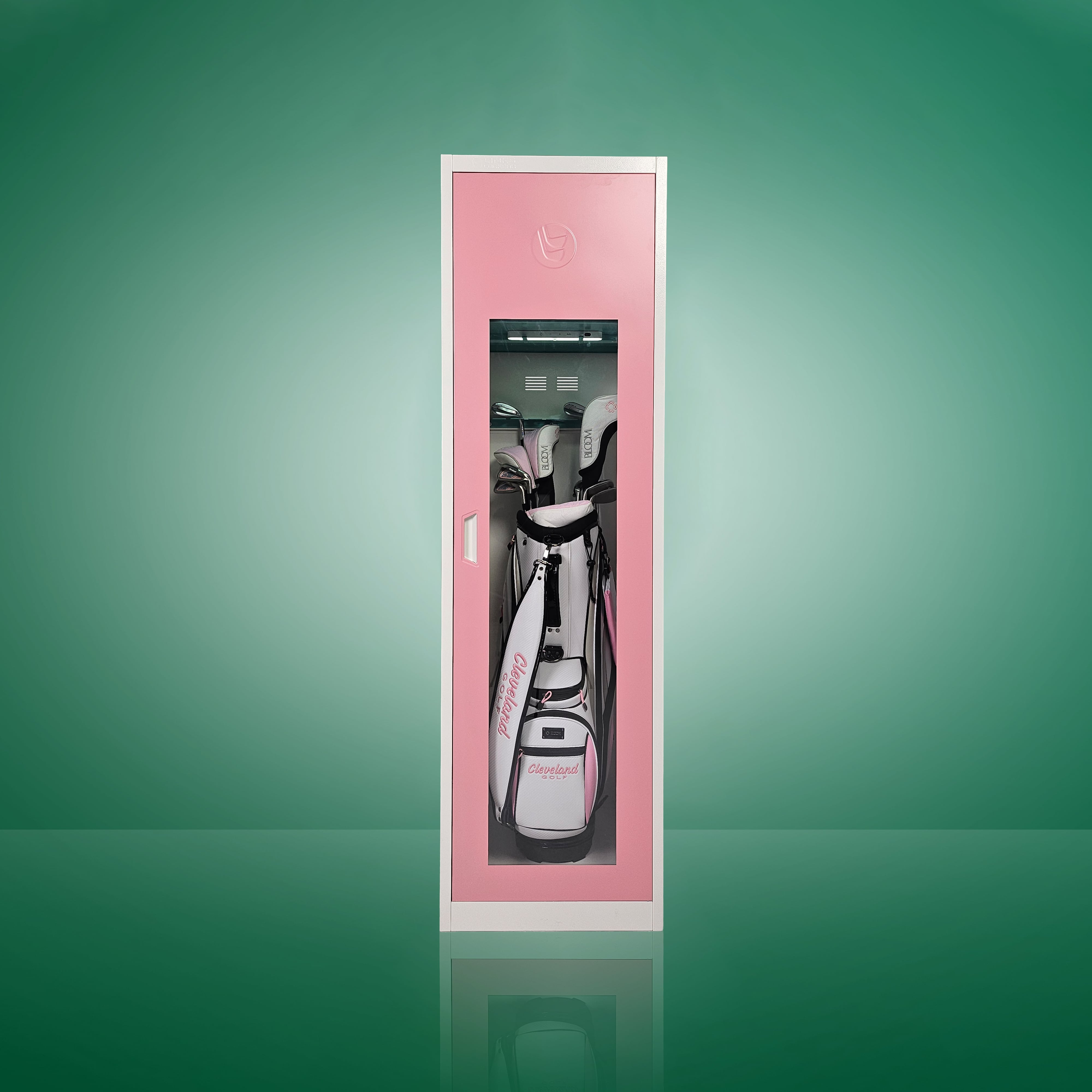 A pink golf bag storage locker with a clear acrylic window, showing golf clubs and equipment neatly organized inside.