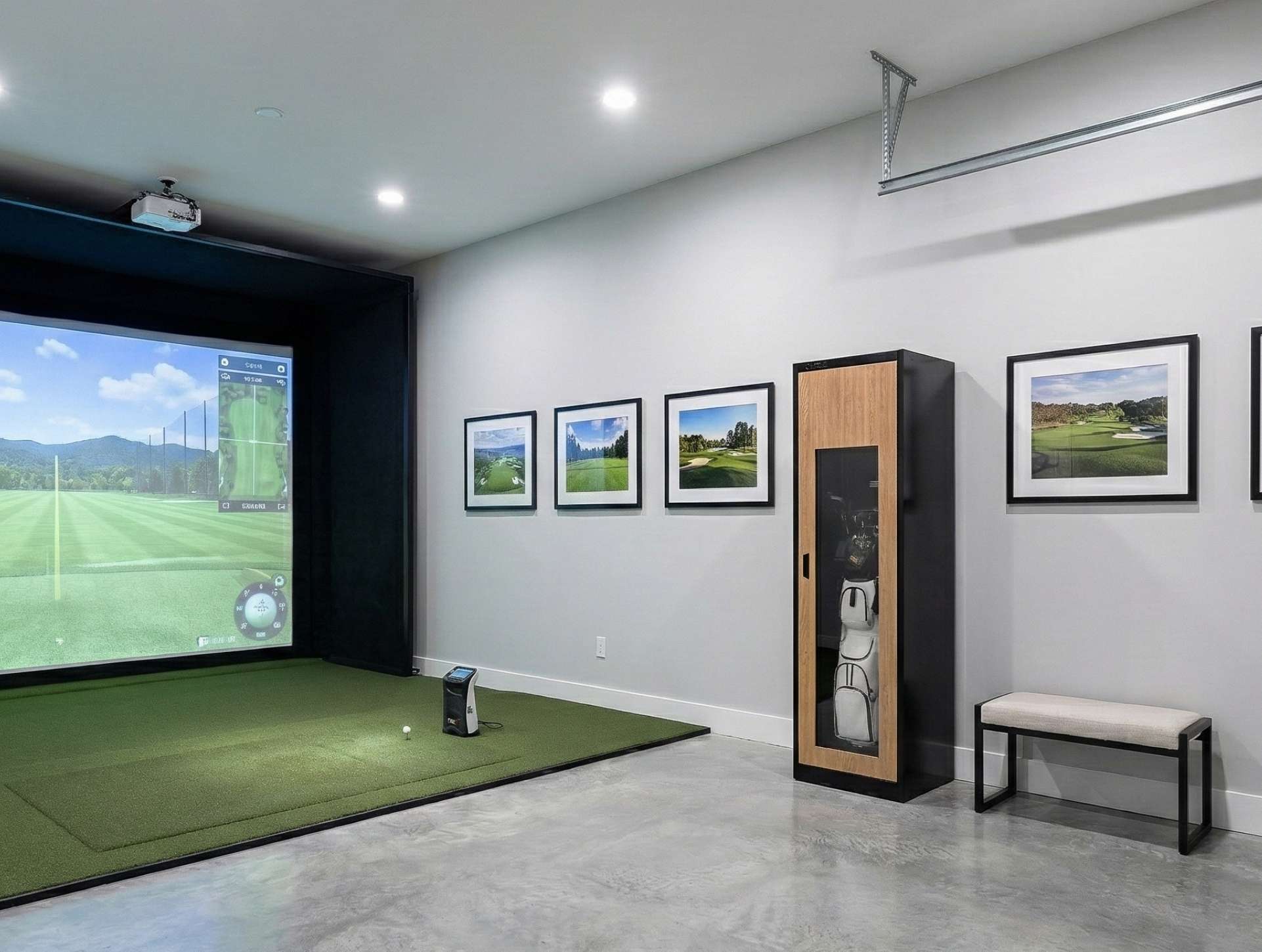 Golf simulator setup in a room with Links Lockers for golf gear storage.