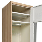 Wooden locker with open door revealing interior shelves and compartments.